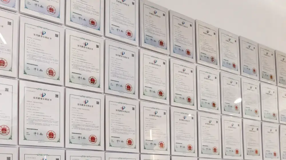 Certificate wall, clearly displaying various honorary certificates